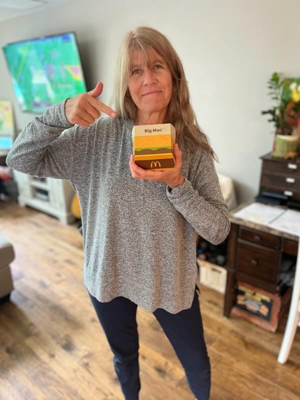 Supporter holding a Big Mac box