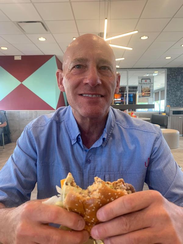 Supporter holding a Big Mac
