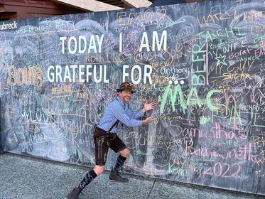 Chalkboard wall reading Today I am grateful for Mac